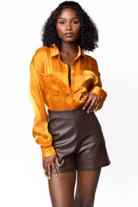 THE BROWN FLARE VEGAN LEATHER SHORTS